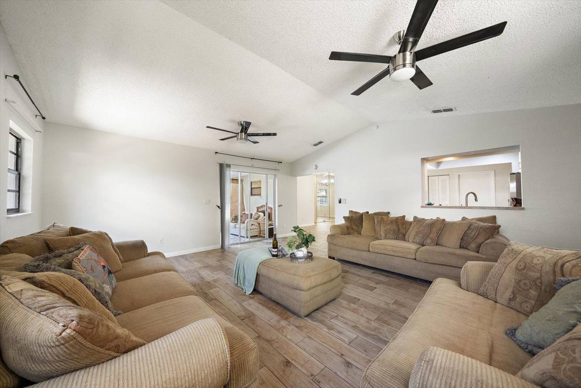 Open living room with vaulted ceiling